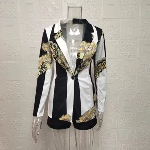 Detailed view of women's black and white stripe blazer with gold baroque print and shorts.
