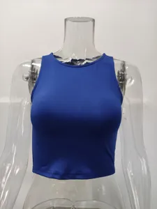 Detail view of the vibrant blue sleeveless crop top, showcasing the clean round neckline design.