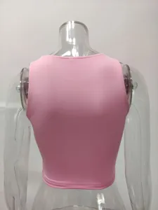 Back view detail of a solid pink sleeveless round neck crop top tank top, fitted style.