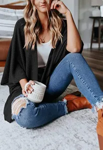 Women black waffle knit cardigan loose three quarter sleeve sweater lifestyle detail view