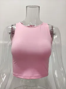 Pink sleeveless round neck crop top detail view, solid color basic summer fashion style.