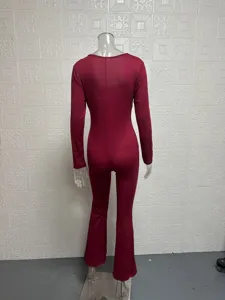 Detailed view of women's long sleeve high waist flare leg stretchy jumpsuit in red color.