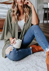Waffle knit cardigan for women, casual loose autumn sweater with three-quarter sleeves.