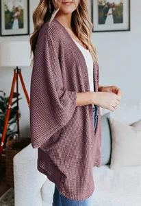 Waffle knit cardigan for women, loose fit open front sweater with three-quarter sleeves.