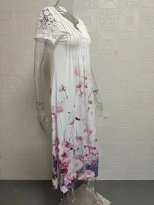 Elegant women short sleeve long dress with beautiful floral print and delicate lace trim.
