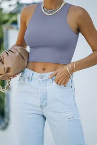 Solid color sleeveless round neck racerback crop top for women summer casual wear.