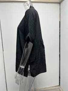 Casual black loose short sleeve V-neck summer shirt detail view, breathable light fabric.