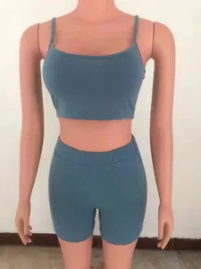 Detailed view of the solid color casual crop top and biker shorts two-piece set in grey blue.