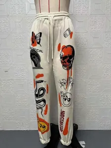 Women high waist casual sweatpants fleece lined streetwear skull graphic printed long trousers.