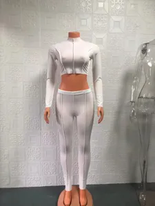 White two piece crop top and high waist leggings set long sleeve ribbed outfit for women.