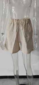 Baumwolle Leinen High Waist Shorts Detail, beige weite Freizeithose mit Taschen.