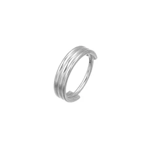 Detailed shot of titanium triple-ridged seamless segment ring, piercing jewelry detail view.