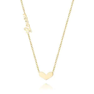Elegante goldene Herz Halskette mit stilvollem Buchstaben Detail, minimalistischer Schmuck.