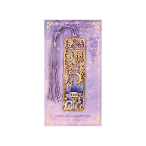 Exquisite metal butterfly bookmark with purple tassel and decorative card for daily reading.