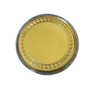 Pièce commémorative vierge sous étui de protection transparent couleur or gravure.