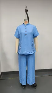 Casual blue linen two piece set short sleeve button shirt and wide leg pants for women.