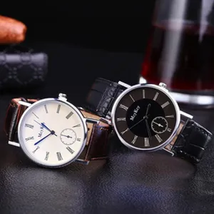 Detailed close-up view of quartz men's watch with leather strap and roman numeral dial.
