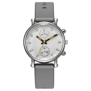 Reloj de cuarzo para mujer con correa de silicona gris esfera de diamantes de imitacion.