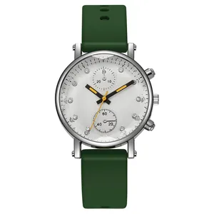 Reloj de cuarzo para mujer con correa de silicona verde esfera blanca y diamantes.