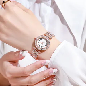 Detailed closeup of a glamorous rhinestone quartz women watch with Roman numeral dial.