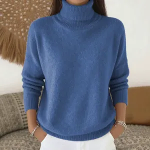 Blue turtleneck knitted sweater detail shot, cozy winter casual style knitwear close up.