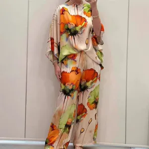 Chic satin floral two-piece set featuring a loose top and elegant wide-leg pants for summer.