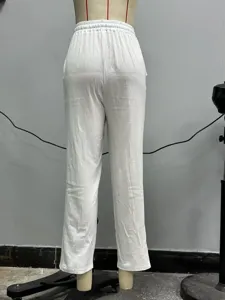Pantalon décontracté pour femme couleur unie blanc avec cordon, longueur cheville.