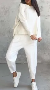 White long sleeve sweatshirt and harem pants lounge set detail view, comfortable casual daily wear.