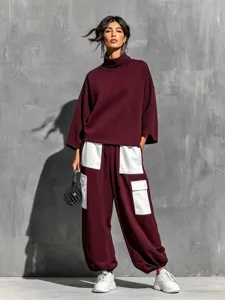 Women's high-neck sweatshirt and loose patchwork cargo pants two-piece set for autumn.
