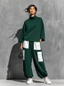 Detailed view of the women casual turtleneck sweatshirt and contrast pocket cargo pants set.