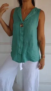 Close-up detail of the women's V-neck sleeveless linen shirt showing the unique fake cardigan design.