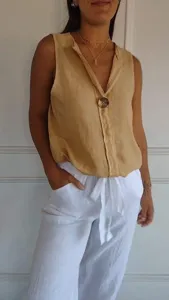 Sleeveless linen V-neck casual top detail view, breathable summer apparel clothing shot.