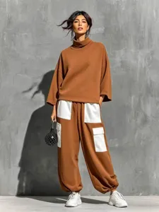 Women casual turtleneck sweatshirt and cargo pants two-piece set, autumn winter fashion apparel.