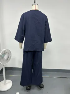 Back detail view of the solid navy blue casual linen two-piece set, plus size style.