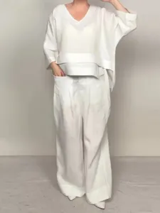 Women casual solid color loose V-neck top and wide leg pants two piece linen set detail view.