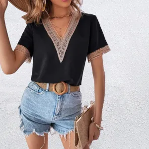 Detail view of the black short sleeve top with elegant lace V-neck trim, perfect for summer.