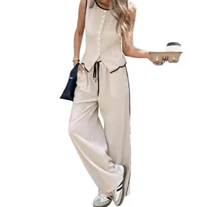 Set casual da donna con gilet e pantaloni larghi eleganti per un look estivo alla moda.
