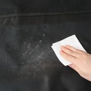 Organizador negro para asiento de coche estera antipatadas hecha de tela facil de limpiar.