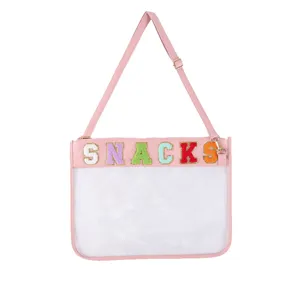 Sac de document transparent en TPU rose avec des lettres en feutre colorées SNACKS.