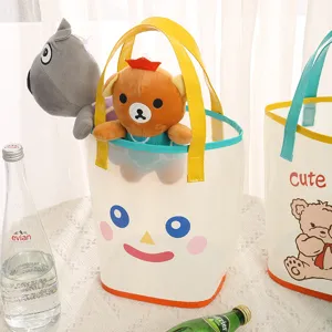 Bolso de playa transparente de PVC con tierno estampado de dibujos, ideal para juguetes.