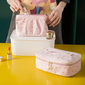 Pink velvet cosmetic bag with gold stars, large capacity portable makeup storage pouch.