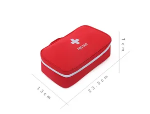 Detailed view of the red portable first aid bag with clear dimensions and white cross design.