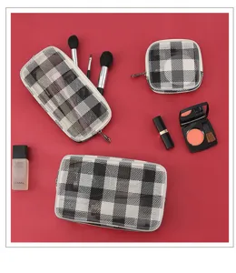 Set de 3 bolsas de maquillaje de malla transpirable, estuche de viaje a cuadros negro y blanco.