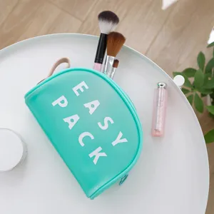 Trousse de maquillage en TPU vert menthe pour voyage et rangement avec poignée pratique.
