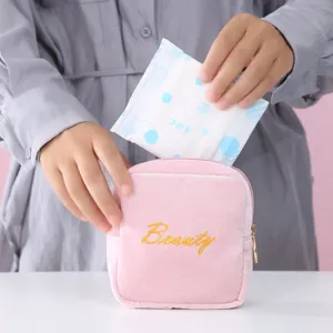 Portable pink velvet sanitary napkin storage bag and travel period pouch for women