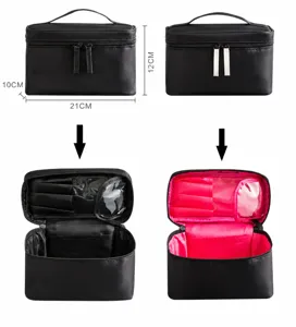 Schwarze Kosmetiktasche tragbar mit Pinselfächern und wasserdichtem Material für Reisen.