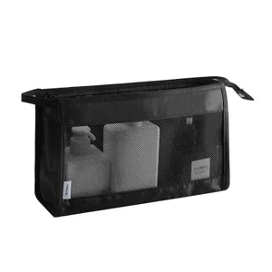 Sac de voyage cosmétique portable noir avec fenêtre en filet et poignée pratique pour les articles.