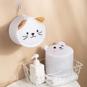 Cute cartoon bra laundry bag mesh washing bag with hanging cat and standing bear designs.