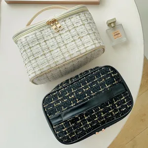Tweed cosmetic bag for women, large capacity portable makeup pouch with handle chic design.