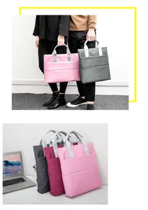 Sac cabas pour ordinateur portable et mallette d'affaires avec plusieurs poches pratiques.